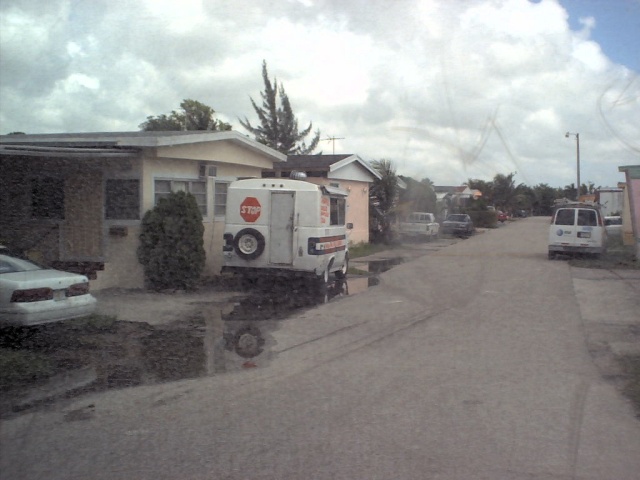 ... the picturesque Li'l Abner Mobile Home Park, in beautiful Sweetwater, Florida.
(I would have gotten better photos of Pet Heaven, if not for the fact that it would require getting off the bus *here* for ~30 minutes.