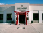 The front entrance, framed by not only that neat Japanese gate, but... a GPS reference point (at the common vertex of the b/w triangles).