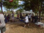 The pinata swinging away, dumping candy, after taking a fatal blow from a large wooden dowel of DOOOOM. (My bike looks on from the sidelines, perfectly innocent.)