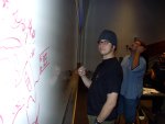 Behind the scenes, we see some further doodling taking place