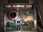 I had to open up the transmitters to set an option jumper down on that lower right board. Now, take a moment to admire that toroidal power transformer. Is that not AWESOME? I can just imagine the happy electrons coursing through it now, bringing our signal to our listeners on and around campus... COMING SOON!