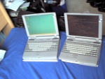 New laptop, and old laptop (note that the old one's display goes all red and wonky at the right side... gravity kills. Call your congressperson and say NO to the law of gravity today!